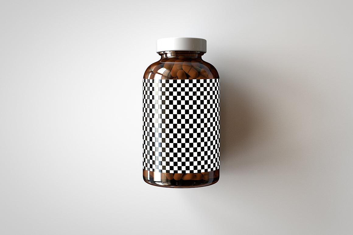 A shiny glass amber supplement/vitamins bottle mock-up full of pills on a white surface with an editable label on the front of the bottle