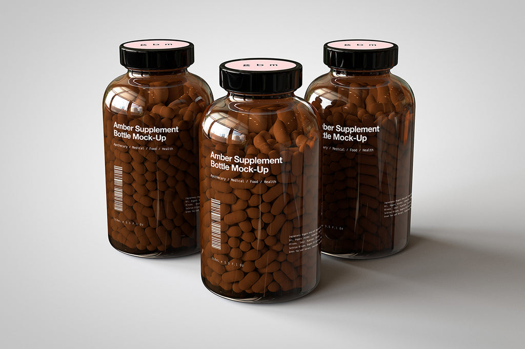 A shiny glass amber supplement/vitamins bottle mock-up full of pills on a white surface with an editable label on the front of the bottle - there are the bottles in the scene. One in the centre and the other two bottles either side.
