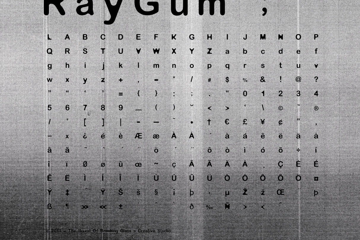 RayGum - Sans Serif Grunge Font - Free - Design by The Sound Of Breaking Glass