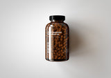 Amber Supplement Bottle With Pills Inside Bottle Mock-Up